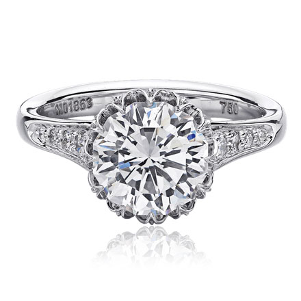 Christopher Designs ring with Crisscut Round center surrounded by round diamonds